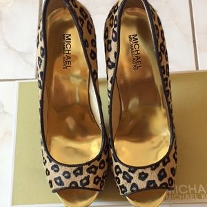 Leopard Peep toe pumps
